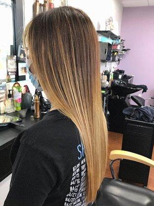 Nelly's Hair Design (inside Plaza I-35)