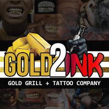 Gold 2 ink (gold grillz)(tattoos)