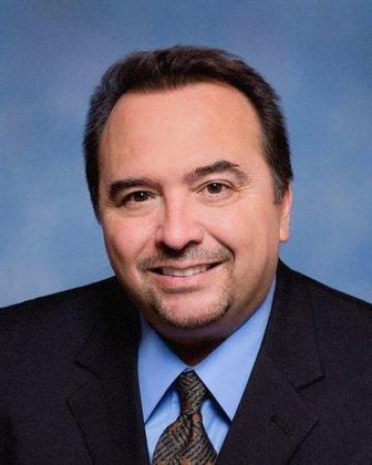 Dr. V. Greg Gonzaba