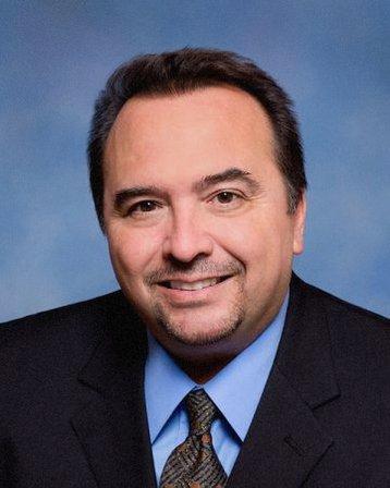 Dr. V. Greg Gonzaba